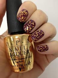 I love "Man With the Golden Gun" from OPI.  It contains real 18K gold flecks (as shown in photo).